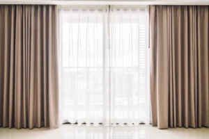 Clean curtains hanging neatly in a bright living room